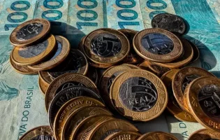 Caixa paga Bolsa Família para beneficiários com NIS final 2; valor médio é de R$ 679,19